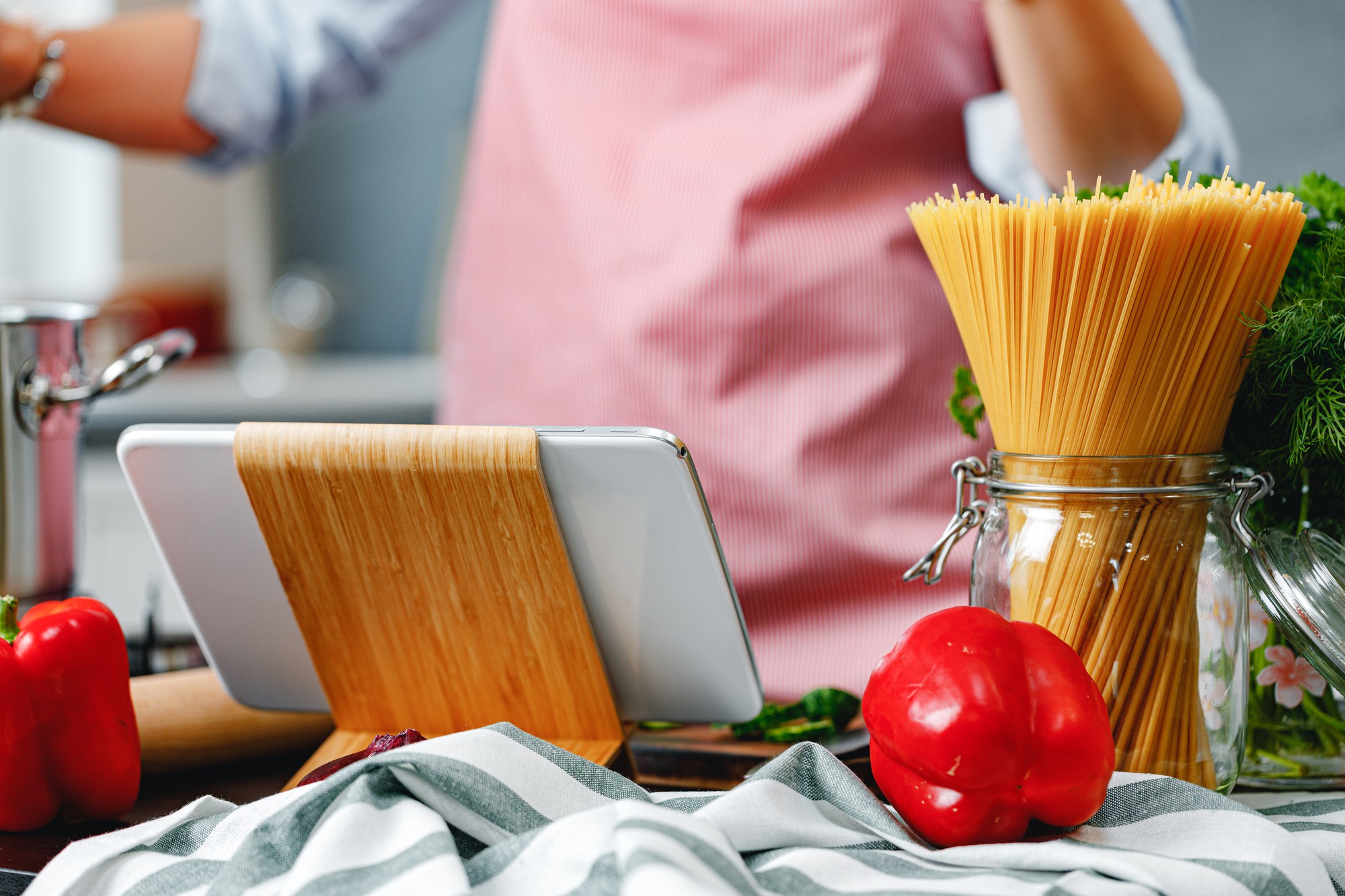 Instructional kitchen workspace with utensils and ingredients